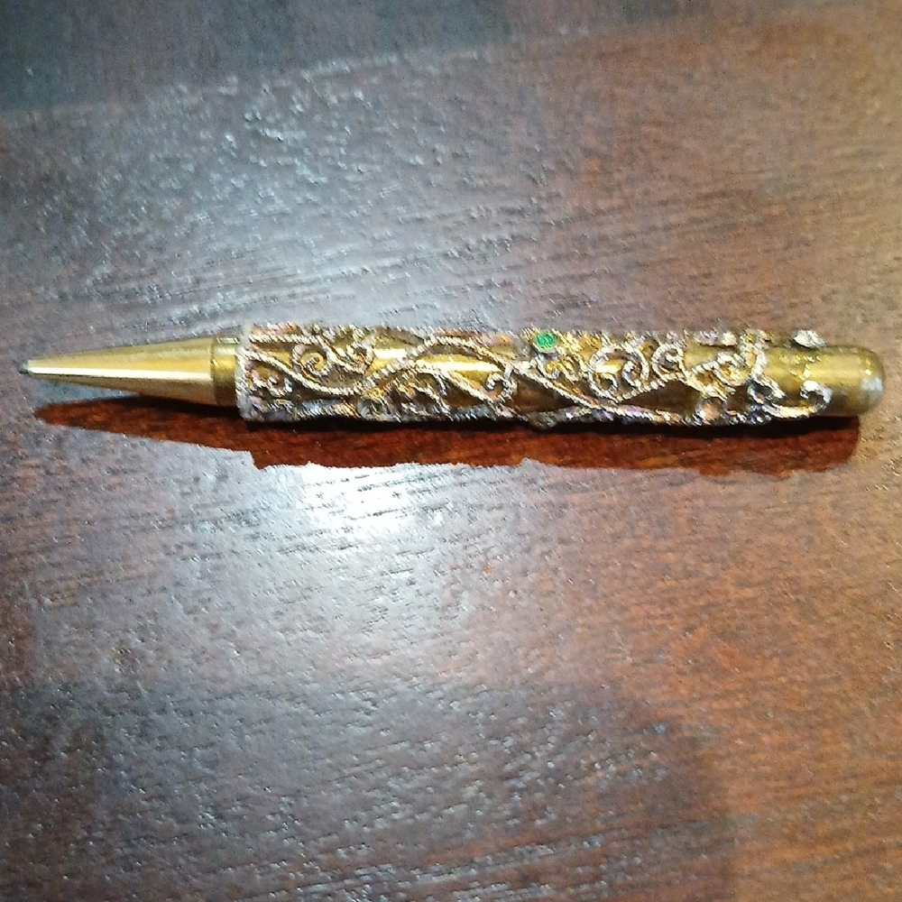 Intricate Gold and Silver Decorative Pen